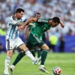 "It’s 100% a Red Card" — Pundits Slam Referee for Sparing Messi in Algeria Clash Messi tacle on Algeria's Aïssa Mandi